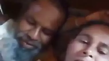 An old man enjoys the boob sucking of a desi lady