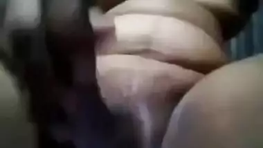 Hungry for cocks Desi MILF sticks long XXX dildo into craving vagina